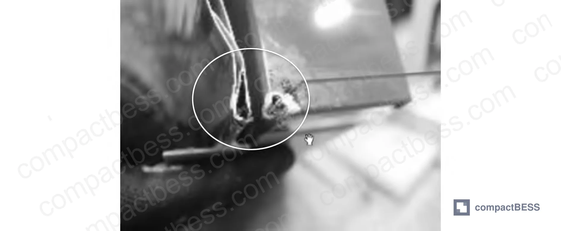Figure 4: PET insulation film breakdown location on prismatic cell — physical puncture specimen showing bottom corner failure